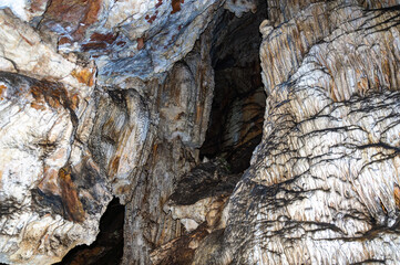 Crimea, Ukraine. Stalactites, stalagmites on the walls of the Emine-Bair-Khosar cave. Template for...