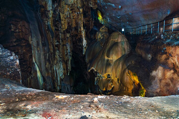 Crimea, Ukraine. Stalactites, stalagmites on the walls of the Emine-Bair-Khosar cave. Template for design. Selective sharpness.