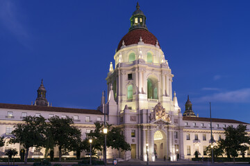 Fototapeta na wymiar Beautiful image of the Pasadena City Hall in Los Angeles County shown against a deep blue sky at dusk. This building is listed in the national Register of Historic Places.