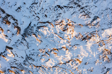 Amazing sunset in the alps of Switzerland. Wonderful flight with a drone over an amazing landscape in the canton of Uri and Glarus. Epic view over a street called Klausenpass.