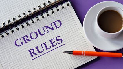 GROUND RULES - words in a white notebook on a purple background with a cup of coffee