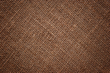 Burlap texture, darkened brown sackcloth fabric for background