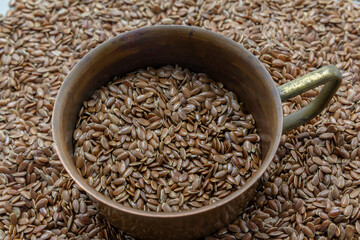 flax seeds, linseed in a cup. Healthy, vegetarian, organic food, diet background, health care background, balanced diet copy space top view horizontal