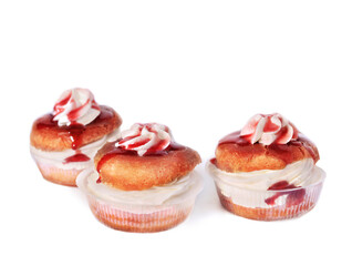 Savarines cakes with whipped cream. Rhum baba cake. 