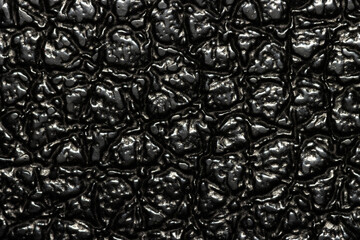 macro texture of surface of black synthetic material