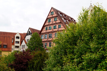 Fototapeta na wymiar Scenic view of a traditional timber-framed house in the city of the Ulm in Germany on a fine day in May (Ulm, Germany, Europe) 