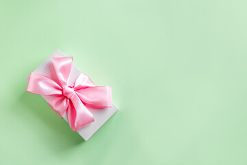 Gift box with pink silk ribbon