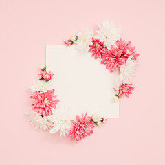 Creative layout made of colorful flowers. Minimal holiday concept. Flat lay pattern.