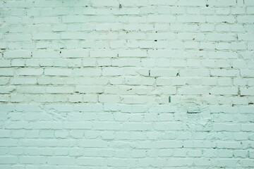 Turquoise or mint color brick wall, surface, background, wallpaper. 