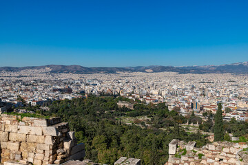 Fototapeta na wymiar Panoramic view of Athens Greece city buildings and ancient landmarks Ancient Agora, iconic Temple of Hephaestus, Athens historic center