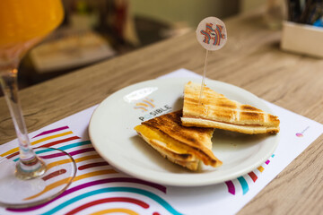 toasted ham and cheese sandwich with orange juice