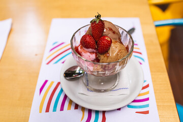 ice cream glass with decoration strawberries