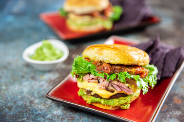 Ham and Cheese Breakfast Burger on top Guacamole