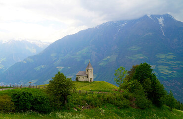 Fototapeta na wymiar an ancient chapel in the Italian Alps of South Tyrol in Aschbach, Vinschgau region (Italy)