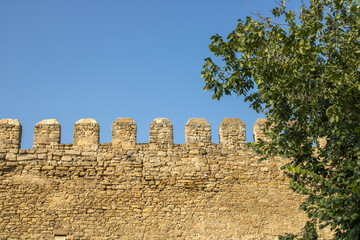 Ancient citadel fortress. Military tower fortifications. Medieval security defensive wall surrounding the old town. Archaeological excavations ruins bastion Ackerman.