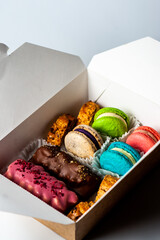 Sweet colorful macarons isolated on white background. Tasty colourful macaroons. High quality photo