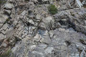 Texture of gray, white and brown mountain stone. Matte painting.