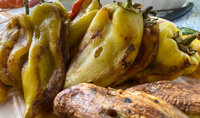 Grilled green bell peppers among other vegetables. Close-up