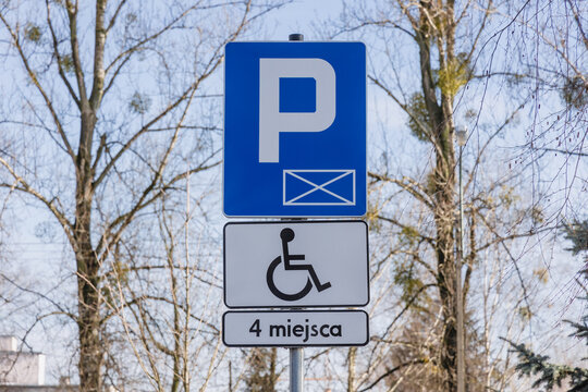 Disabled parking permit on a parking lot in Warsaw city, Poland