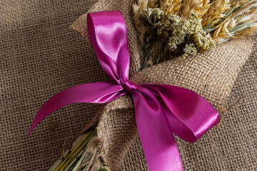 A small bouquet, as a compliment. Holiday. Close up