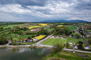 Fototapeta na wymiar Landscape with fishing pond in Miedzyrzecze Gorne, small village in Silesia region of Poland
