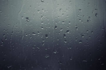 Moody concept. Raindrops on the window. Depression or moody concept photo