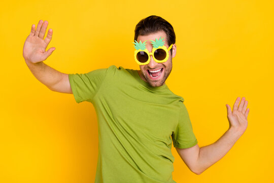 Photo of youth excited guy have fun dancer eyewear tropical theme-party isolated over yellow color background