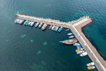 Boats in port of Nesebar historic city on a Black Sea shore in Bulgaria