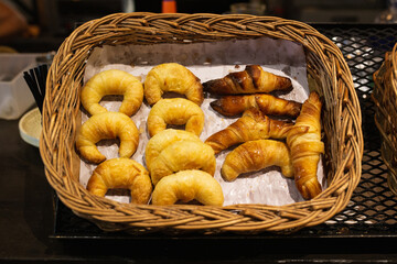 basket with homemade croissants from a bakery