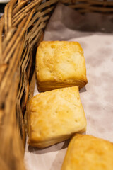 basket with homemade fat biscuits from a bakery