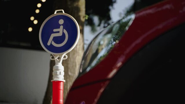 Disabled handicap parking space reserved for handicapped. Parking for people with special needs. Special places for cars. Wheelchair parking symbol. vector icon