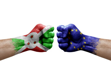 Two hands punch to each others on white background. Country flags painted fists, conflict crisis concept between burundi and european union
