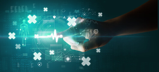 Doctor hand pressing futuristic health device with medical symbol on screen