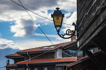 Fototapeta na wymiar Street lamp in Old Town of Nesebar historic city on a Black Sea shore in Bulgaria