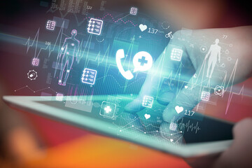 Close-up of a touchscreen with healthcare icons