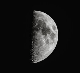 A stunning half moon during a clear night sky. 
