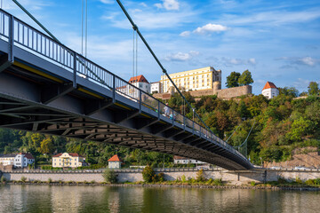 View from rivershore to the Luitpold bridge and the Fortress Veste Oberhaus in Passau, Bavaria, Germany
