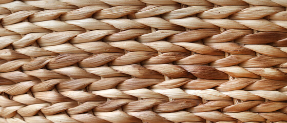 Close up texture woven dried water hyacinth.  Brown background of weaving seamless pattern plants.