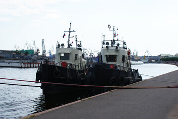 Fototapeta premium The ship is moored on the waterfront near the shipyard, a cargo ship.