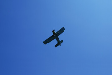 Military retro aircraft from the Second World War in the sky.