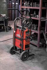 Mobile water-cooled welding set in the workshop.