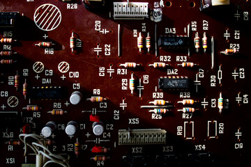 Electric circuit board with components. Detail of old reel-to-reel tape recorder. 