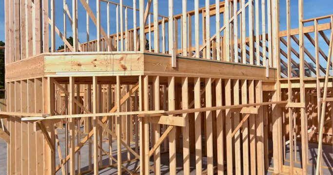 Aerial view wood framing of wood beams framework a new wooden house under construction