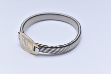 top view shot of friendship band on white background