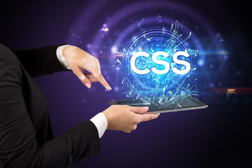 Close-up of a touchscreen with abbreviation.