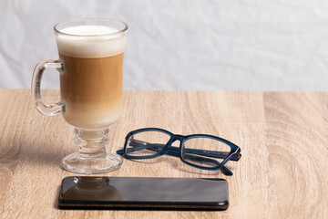 Un café sin lente y celular