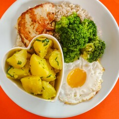 healthy meal top view with chicken egg and vegetables