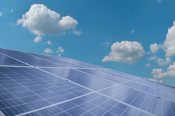 Solar module panels against blue sky background. Environmental energy resources concept.