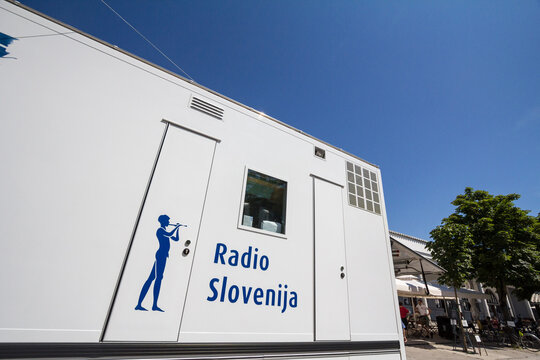 LJUBLJANA, SLOVENIA - JUNE 16, 2021: Logo of Radio Slovenija on a technical bus in ljubljana. Part of RTV Radiotelevizija Slovenija, it's public state broadcasting corporation on radio and television