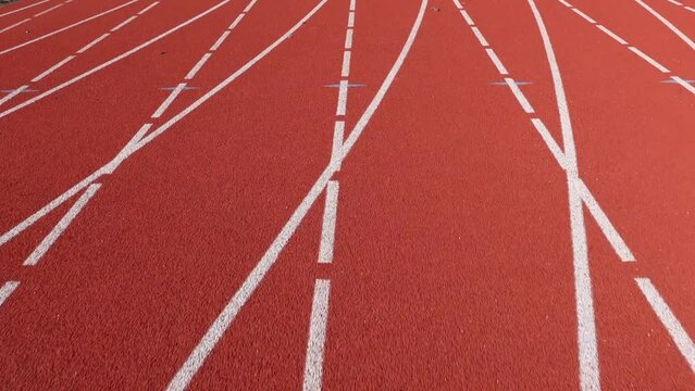 Running on a track and field course in first person view